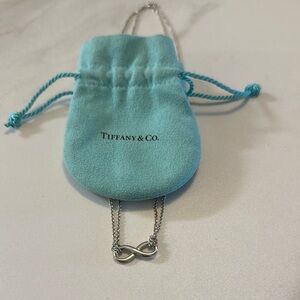 Tiffany & Co. Silver Infinity Necklace with double chain & Tiffany’s Teal Pouch